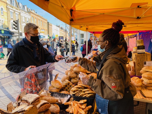 buying-bread-at-oliver's-bakery-love-wimbledon-market